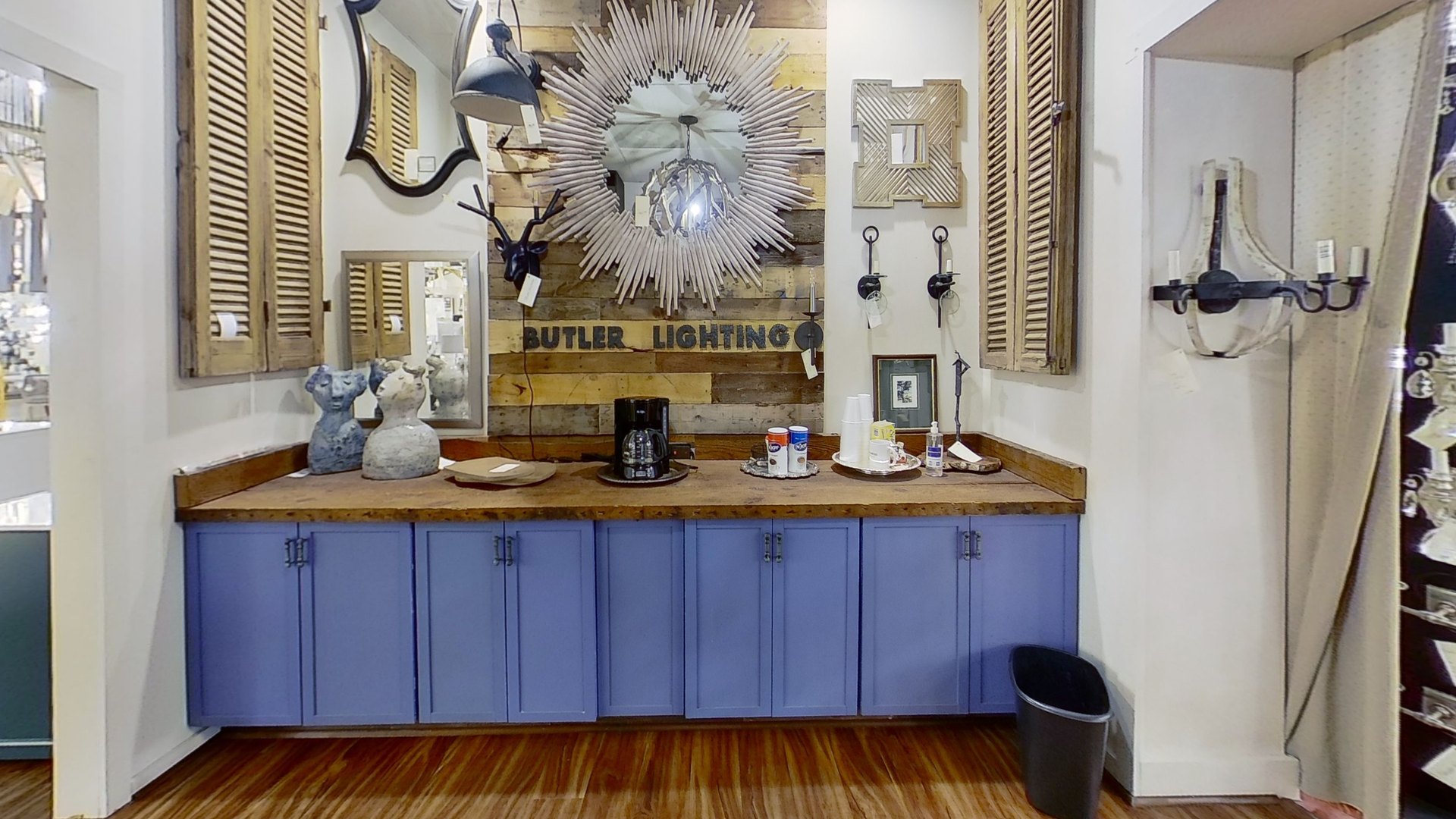 The Butler Lighting name on the wall inside the High Point showroom
